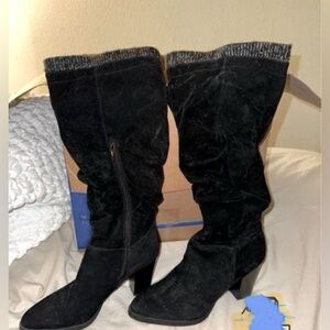 Black mid calf boot.